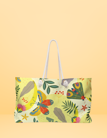 Flutter & Foliage - Nature's dance on a sunny canvas. (Weekender Bag)